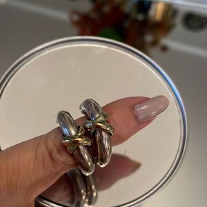 Silver hollow hoop post earrings with gold wrap detailing‎